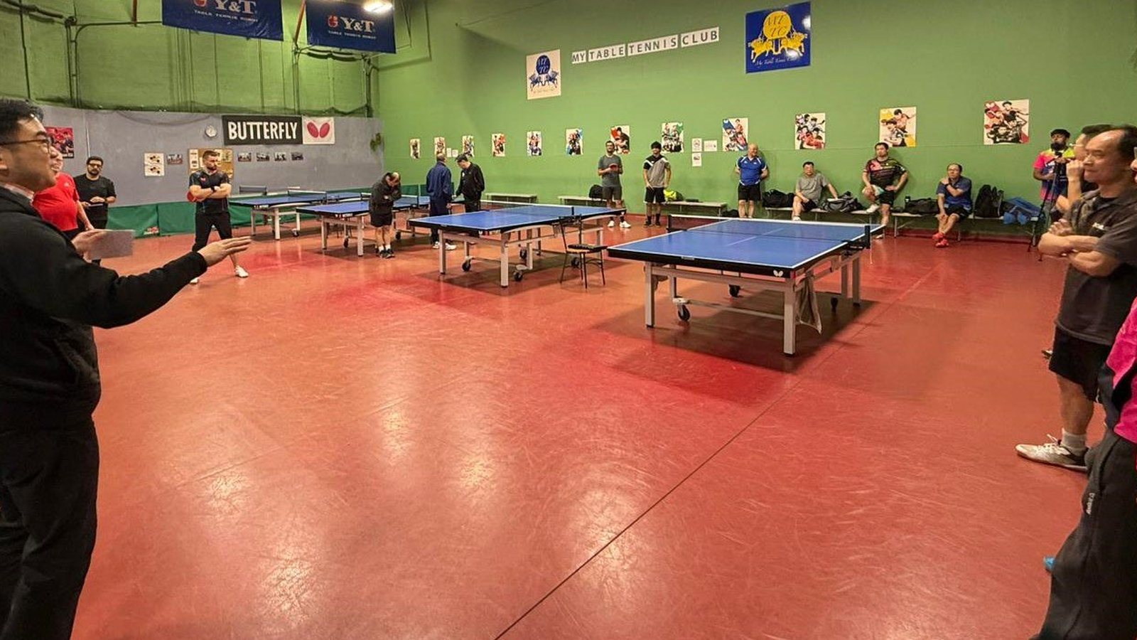 Open play hall with blue tables at My Table Tennis Club Markham