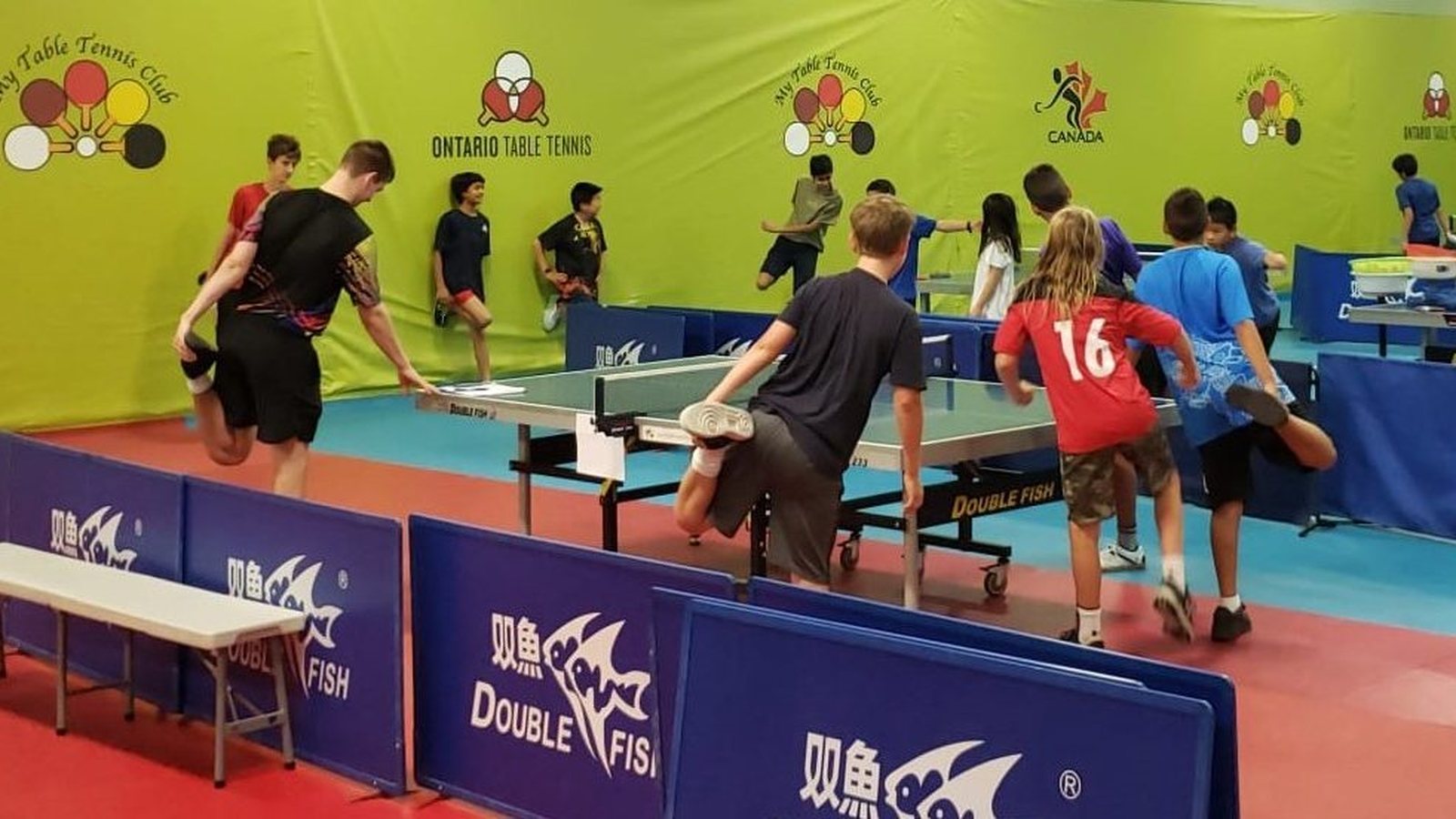 Youth players warming up at My Table Tennis Club Mississauga
